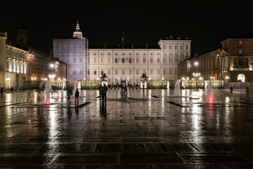 Naklejka premium The beautiful Castle Square in Turin with the Royal Palace illuminated at night