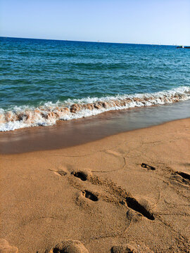 footprints on the beach, seeside, beach, sunny day, Spain, blue see, sand, steps