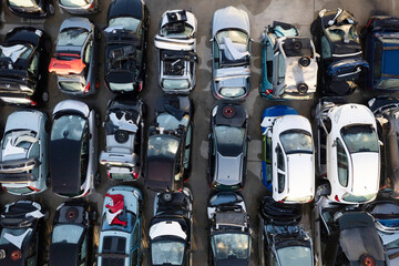 Aerial view of a small car demolition park - obrazy, fototapety, plakaty