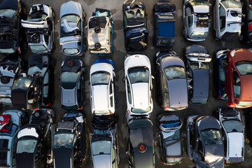 Aerial view of a small car demolition park - obrazy, fototapety, plakaty