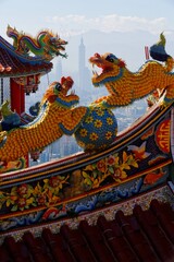 A Taiwanese temple decorated with sacred & auspicious animals (dragons & lions) on the roofs in...