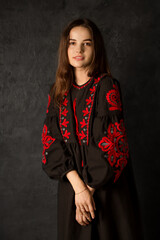 A gentle Ukrainian woman in an embroidered dress