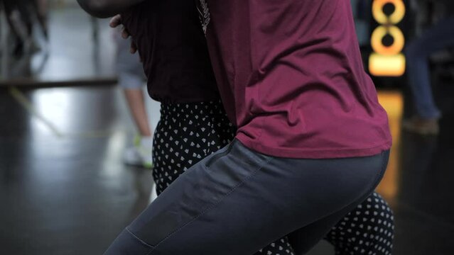 Dancers couple at Caribbean dance class