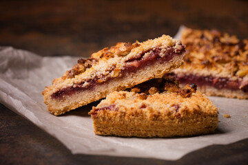 Fototapeta na wymiar Grated cake with jam with walnut flour