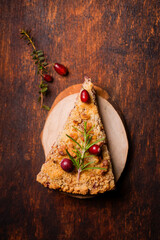 grated cranberry pie on wooden plates