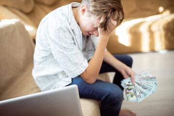 The teenager grabbed his head in despair. The boy does not have enough money to study at the university