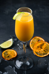 Alcoholic cocktail Mango Daiquiri made from white rum, orange liqueur, mango pieces and juice and...