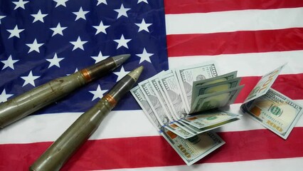 American flag with bullets, shells, cartridges and projectiles on it. Lend-Lease concept.  Army concept. Sales of weapons and ammunition. Military industry, war, global arms trade.