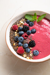 Fruit smoothie bowl with chia seeds