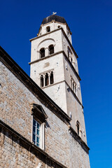 Fototapeta na wymiar Bell tower of the Franciscan Church and Monastery. Dubrovnik, Croatia.