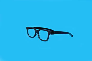 Glasses on a bright blue background