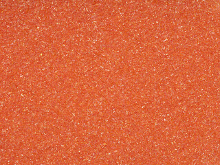 Bright soft orange holographic glitter. Abstract shiny background. Design paper texture for...
