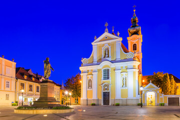 Fototapeta na wymiar Gyor, Hungary. Carmelite Church in the historical center of Gyor.