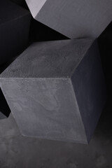 Cement block  near wall as construction concept. Concrete cubes as abstract background