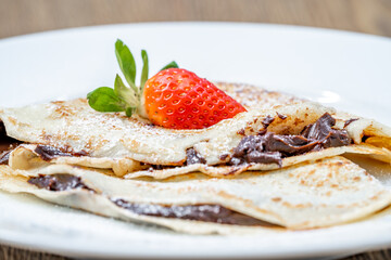 pancake with chocolate and strawberry
