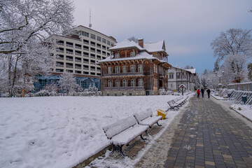 Fototapeta na wymiar Truskavets, Ukraine - November, 2022: Michael Bilas Art Museum and Mirotel Resort and Spa in the center of Truskavets balneological resort. The first snow.