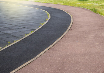 Close-up of a part of a sports stadium with markings for a treadmill