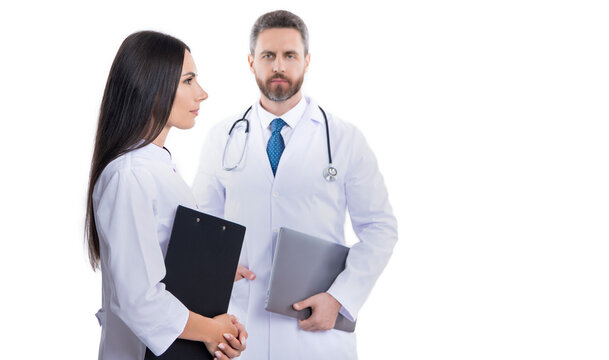 doctor with nurse in studio with copy space. photo of doctor and nurse wear white coat.