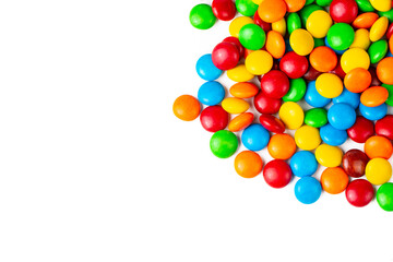 A Pile of Rainbow Colored Candy Coated Chocolate Buttons Isolated