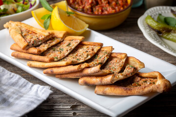 Turkish pide with minced meat, Turkish name; Kiymali Pide. Traditional Turkish cuisine. Turkish pizza Pita with meat.