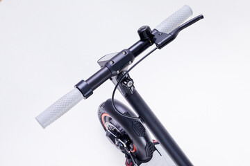 Electric wheel on a white studio background. Wheel from electric scooter. Modern city transport for young people and bussinesman.