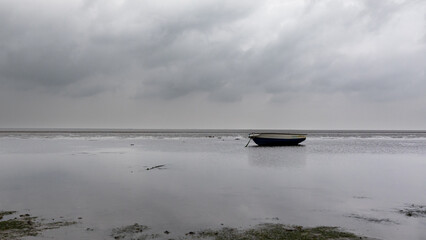 Boat in the Wadden Sea - 547791840