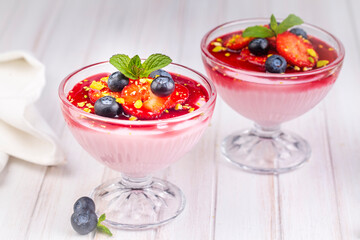 Strawberry Cream Dessert with some blueberries, strawberry pudding. Turkish name; Cilekli puding