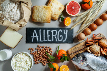 Allergy food concept. allergene - milk, fish, strawberry, bread, eggs, peanuts, citrus, wheat...