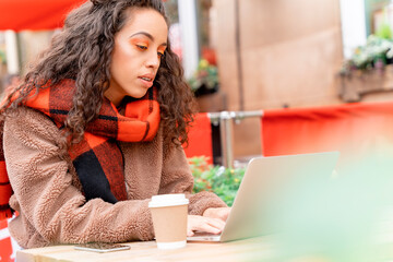 upset womanl student e learning distance training course study working in cafe with cup of coffee....