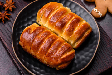 Sweet tasty fresh festive baking on a dark concrete background