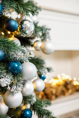 Fototapeta na wymiar Christmas toys close-up on the Christmas tree. New Year, Christmas tree decoration