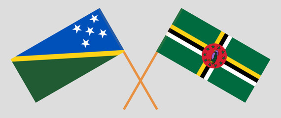 Crossed flags of Solomon Islands and Dominica. Official colors. Correct proportion