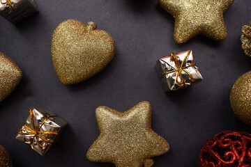 several  golden christmas ornaments on blue  background