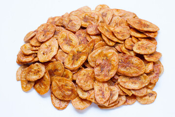 Banana chips on white background