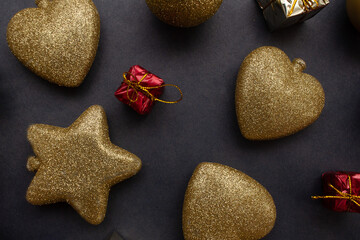 several  golden christmas ornaments on blue  background