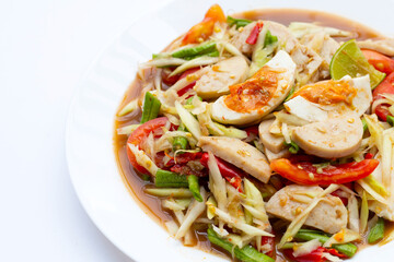 Spicy papaya salad with salted egg and vietnamese pork sausage