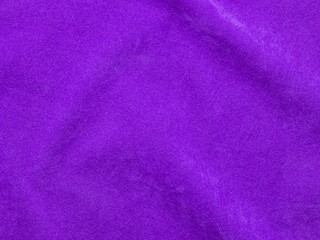 Purple velvet fabric texture used as background. Empty purple fabric background of soft and smooth textile material. There is space for text.