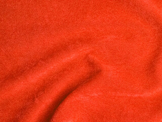 Orange velvet fabric texture used as background. Empty Orange fabric background of soft and smooth textile material. There is space for text.