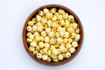 Dried lotus seeds on white background.
