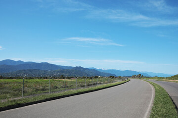 Fototapeta na wymiar Beautiful view of mountains and empty asphalt road