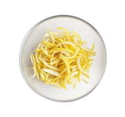Glass bowl of fresh lemon peel isolated on white, top view. Citrus zest