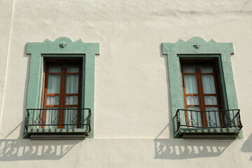 Fototapeta na wymiar Exterior of building with windows and balconies