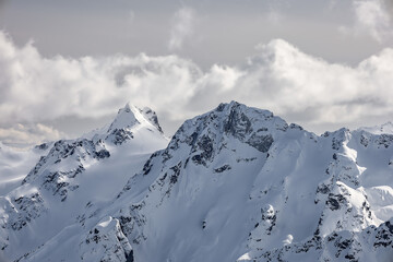 Fototapeta na wymiar Panoramic view of snowy mountains, Mount Matier and Joffre Peak, Duffy Lake area, Whistler, British Columbia, Canada