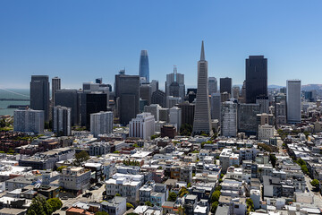 Aerial view of downtown San Francisco with skyscrapers, blue sky, California, USA.