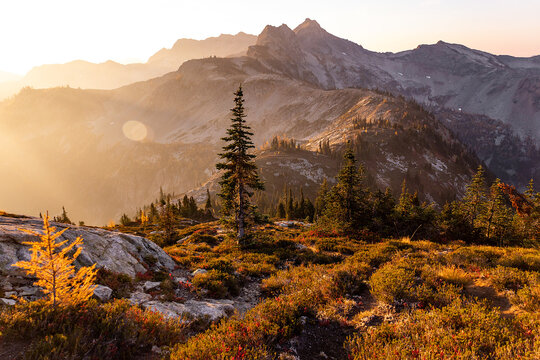 Beautiful colorful fall morning high in mountains during smoke season, Maple Pass, North Cascades National Park, Washington, USA.