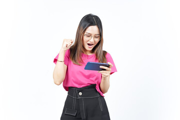 Naklejka premium Playing Mobile Game on Smartphone Of Beautiful Asian Woman Isolated On White Background