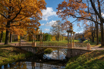 Fototapeta na wymiar View of the Small Chinese Bridge in the Alexander Park of Tsarskoye Selo on a sunny autumn day, Pushkin, St. Petersburg, Russia