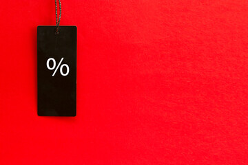 Black friday. Sale tag on the red background