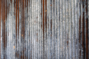 Artistic of old and rusty zinc sheet wall. Vintage style metal sheet roof texture. Pattern of old...