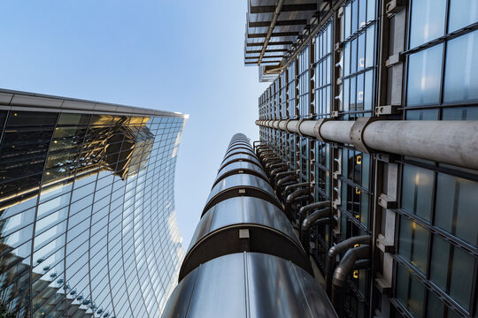 London UK June 10th 2015 : Looking straight up at the Lloyds building reflected in the Willis Tower, Lime Street London